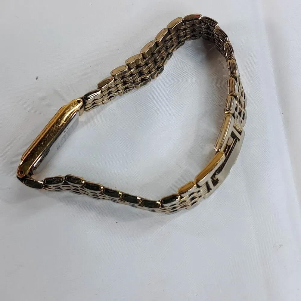 Vintage Seiko Watch Women Gold Tone Gold Dial Rectangle bracelet 2E20-7023 dress